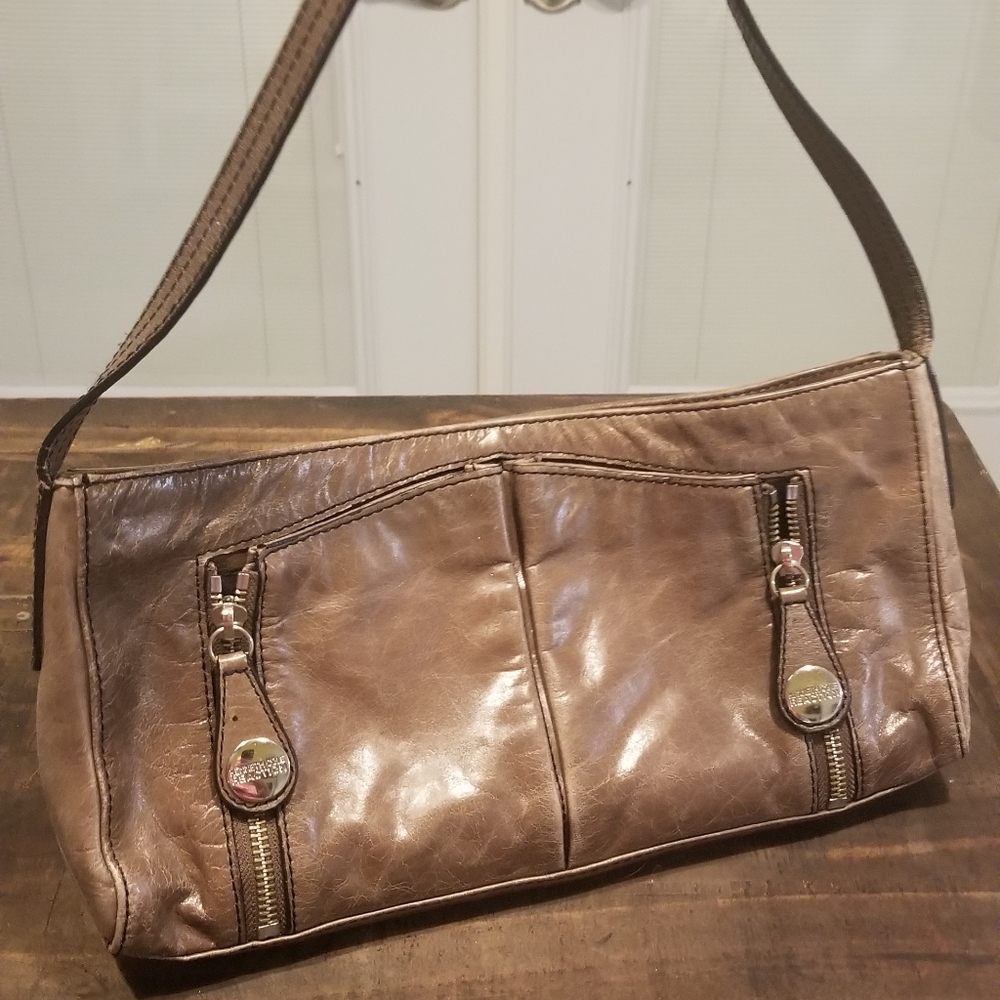 Kenneth Cole reaction clutch
